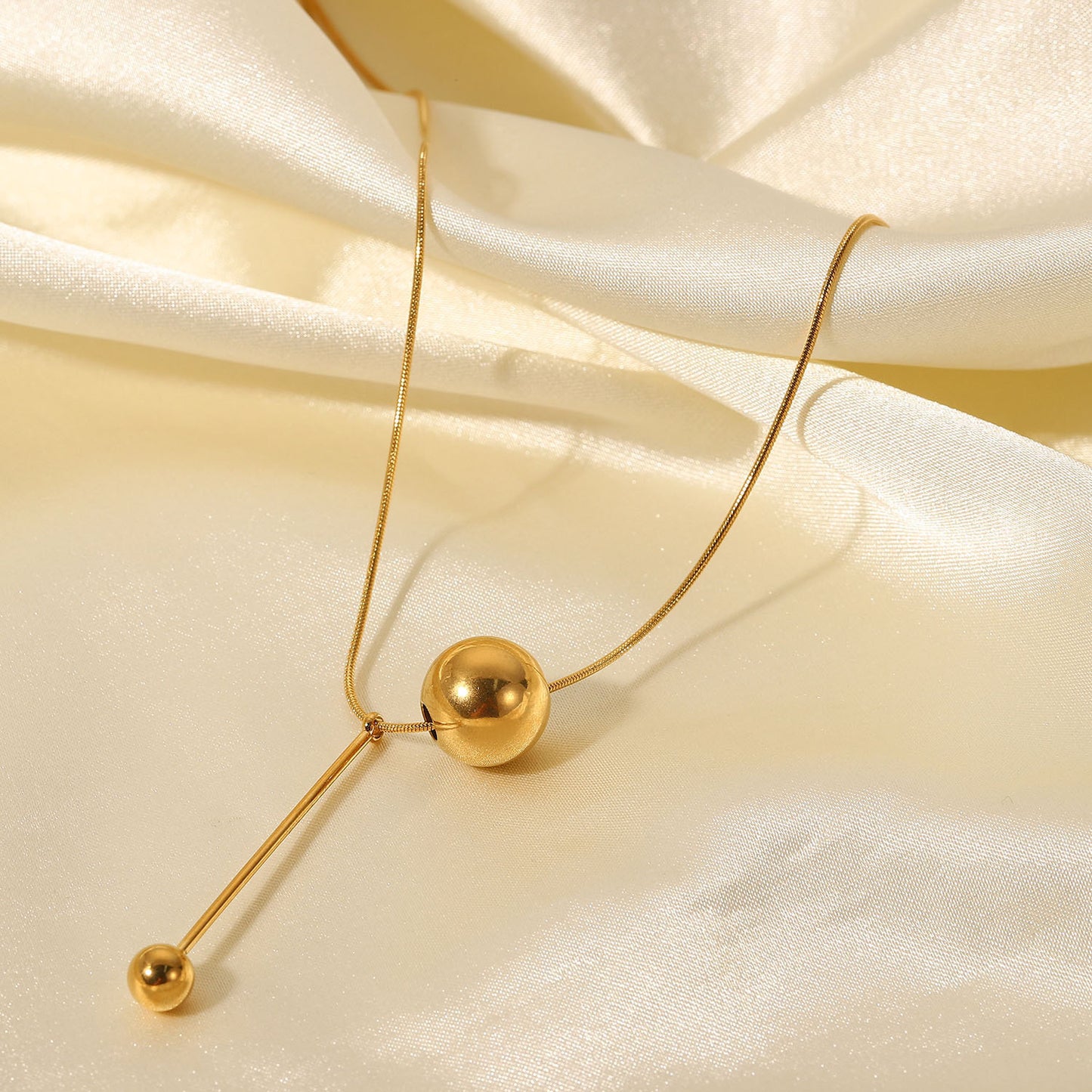 Advanced Gold Ball Pendant Earrings