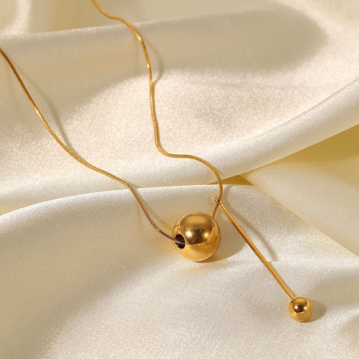 Advanced Gold Ball Pendant Earrings